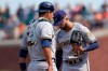 Milwaukee Brewers pitcher Devin Williams, right, meets on the mound with catcher Luke Maile during the eighth inning of the team's baseball game against the San Francisco Giants in San Francisco, Thursday, Sept. 2, 2021. (AP Photo/Jeff Chiu)