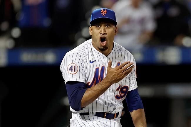 New York Mets pitcher Edwin Diaz reacts after the final out during the ninth inning of a baseball game against the Miami Marlins, Thursday, Sept. 2, 2021, in New York. (AP Photo/Adam Hunger)