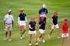 From left, Bubba Watson, Jessica Korda, Ally Ewing, Megan Khang, Morgan Pressel and Nelly Korda approach the seventh green during practice for the Solheim Cup golf tournament, Friday, Sept. 3, 2021, in Toledo, Ohio. (AP Photo/Carlos Osorio)