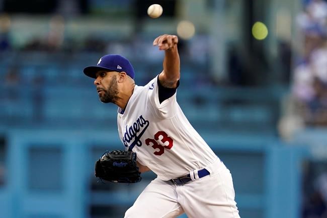 Los Angeles Dodgers pitcher David Price throws to a Colorado Rockies batter during the second inning of a baseball game Saturday, Aug. 28, 2021, in Los Angeles. (AP Photo/Marcio Jose Sanchez)