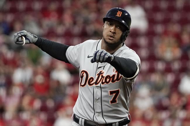 Detroit Tigers' Jonathan Schoop rounds the bases after hitting a solo home run during the third inning of a baseball game against the Cincinnati Reds, Friday, Sept. 3, 2021, in Cincinnati. (AP Photo/Jeff Dean)