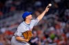 New York Mets starter Rich Hill delivers a pitch during the third inning of the team's baseball game against the Washington Nationals, Friday, Sept. 3, 2021, in Washington. (AP Photo/Nick Wass)