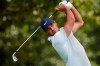 Brooks Koepka hits from the tee on the third hole during second-round play in the Tour Championship golf tournament at East Lake Golf Club, Friday, Sept. 3, 2021, in Atlanta. (AP Photo/Brynn Anderson)