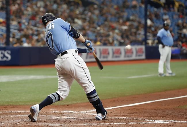 Tampa Bay Rays' Austin Meadows hits a two-run home run against the Minnesota Twins during the fifth inning of a baseball game on Sunday, Sept. 5, 2021, in St. Petersburg, Fla. (AP Photo/Scott Audette)