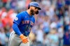 New York Mets' Kevin Pillar reacts after he hit a grand slam during the ninth inning of a baseball game against the Washington Nationals, Sunday, Sept. 5, 2021, in Washington. (AP Photo/Nick Wass)