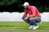 Jon Rahm looks over his putt on the second hole during the final round of play in the Tour Championship golf tournament at East Lake Golf Club, Sunday, Sept. 5, 2021, in Atlanta. (AP Photo/Brynn Anderson)