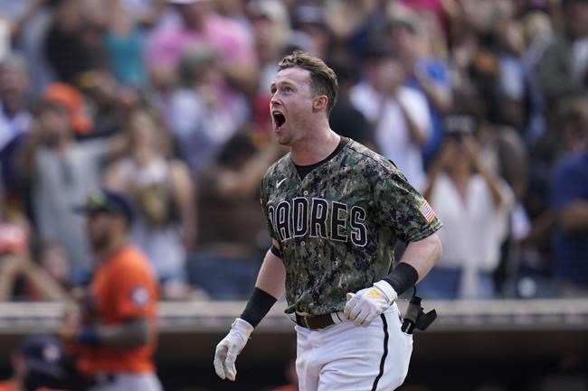 San Diego Padres' Jake Cronenworth reacts after hitting a walk-off home run during the ninth inning of a baseball game against the Houston Astros, Sunday, Sept. 5, 2021, in San Diego. The Padres won, 4-3. (AP Photo/Gregory Bull)