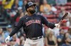 Cleveland Indians' Franmil Reyes watches his two-run double during the ninth inning of a baseball game against the Boston Red Sox, Sunday, Sept. 5, 2021, in Boston. (AP Photo/Michael Dwyer)