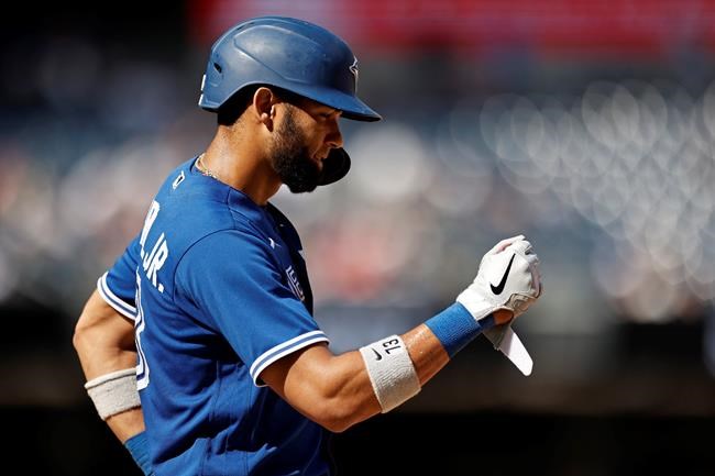 Toronto Blue Jays' Lourdes Gurriel Jr. reacts after being walked during the ninth inning of a baseball game against the New York Yankees, Monday, Sept. 6, 2021, in New York. (AP Photo/Adam Hunger)