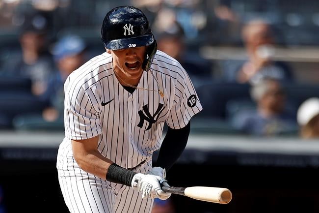 New York Yankees' Gio Urshela reacts after flying out against the Toronto Blue Jays during the eighth inning of a baseball game on Monday, Sept. 6, 2021, in New York. (AP Photo/Adam Hunger)