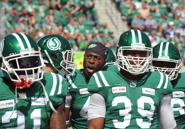 Saskatchewan Roughriders linebacker Derrick Moncrief, centre, celebrates an interception during first half CFL action against the Winnipeg Blue Bombers, in Regina on Sunday, Sept. 1, 2019. The Edmonton Elks have beefed up their defence, signing former NFL linebacker Derrick Moncrief.THE CANADIAN PRESS/Mark Taylor