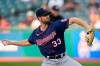Minnesota Twins starting pitcher John Gant delivers in the first inning of the team's baseball game against the Cleveland Indians, Tuesday, Sept. 7, 2021, in Cleveland. (AP Photo/Tony Dejak)