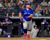 Toronto Blue Jays' Alejandro Kirk tosses his bat after hitting a home run against the New York Yankees during the eighth inning of a baseball game Tuesday, Sept. 7, 2021, at Yankee Stadium in New York. (AP Photo/Bill Kostroun)