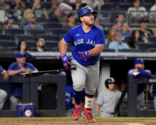 Toronto Blue Jays' Alejandro Kirk tosses his bat after hitting a home run against the New York Yankees during the eighth inning of a baseball game Tuesday, Sept. 7, 2021, at Yankee Stadium in New York. (AP Photo/Bill Kostroun)