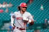 Cincinnati Reds' Jonathan India runs the bases after his home run off Chicago Cubs starting pitcher Adrian Sampson during the first inning of a baseball game Tuesday, Sept. 7, 2021, in Chicago. (AP Photo/Charles Rex Arbogast)