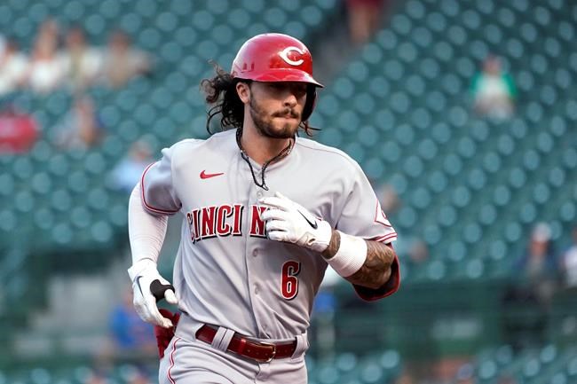 Cincinnati Reds' Jonathan India runs the bases after his home run off Chicago Cubs starting pitcher Adrian Sampson during the first inning of a baseball game Tuesday, Sept. 7, 2021, in Chicago. (AP Photo/Charles Rex Arbogast)