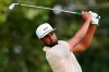 Tony Finau hits from the tee on the second hole during second-round play in the Tour Championship golf tournament at East Lake Golf Club, Friday, Sept. 3, 2021, in Atlanta. (AP Photo/Brynn Anderson)