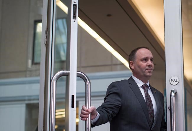 British Columbia Education Minister Mike Bernier arrives for a news conference in Vancouver on January 14, 2016. A federal election all-candidates debate in British Columbia's northeast was cancelled due to concerns about the safety of candidates and the public in a community where tensions over COVID-19 rules, regulations and vaccines are high. The debate hosted by the Dawson Creek and District chamber of commerce was scheduled for Tuesday night, but officials decided being able to host a safe and orderly meeting was too risky. THE CANADIAN PRESS/Darryl Dyck