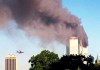 FILE - A plane approaches New York's World Trade Center moments before it struck the tower at left, as seen from downtown Brooklyn, Tuesday, Sept. 11, 2001. On that day, Howie Rumberg, working the overnight in AP Sports, came up out of a subway and found himself in the middle of chaos. (AP Photo/ William Kratzke)