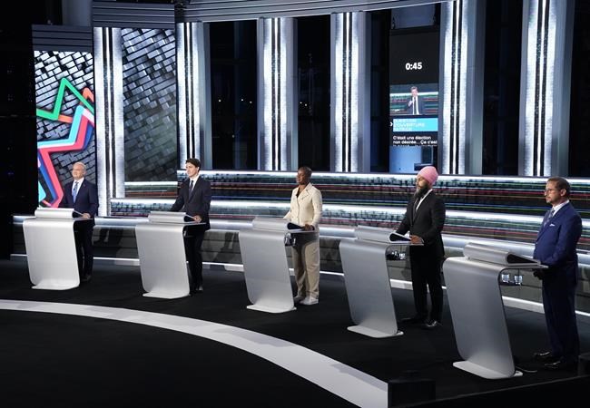 Conservative leader Erin O'Toole, Liberal leader Justin Trudeau, Green leader Annammie Paul, New Democratic Party leader Jagmeet Singh and Bloc leader Yves-Francois Blanchet stand at their podiums before the federal election French-language leaders debate, Wednesday, September 8, 2021 in Gatineau, Que. THE CANADIAN PRESS/Sean Kilpatrick