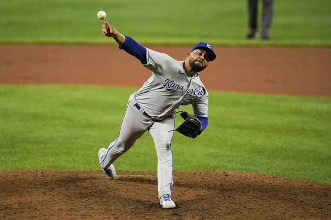 Kansas City Royals relief pitcher Joel Payamps throws a pitch to the Baltimore Orioles during the eighth inning of baseball game, Wednesday, Sept. 8, 2021, in Baltimore. (AP Photo/Julio Cortez)