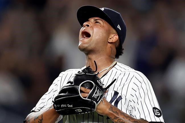 New York Yankees pitcher Luis Gil reacts after the last out in the top of the third inning of the team's baseball game against the Toronto Blue Jays on Wednesday, Sept. 8, 2021, in New York. (AP Photo/Adam Hunger)