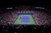 Novak Djokovic, foreground, of Serbia, serves to Matteo Berrettini, of Italy, during the quarterfinals of the U.S. Open tennis tournament at Arthur Ashe Stadium, Wednesday, Sept. 8, 2021, in New York. (AP Photo/Frank Franklin II)
