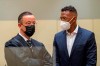 Professional footballer and former national player Jerome Boateng, right, stands with his lawyer Kai Walden, left, at the beginning of the trial against him at the District Court in Munich, Germany, Thursday, Sept. 9, 2021. Boateng is being tried on charges of assault. (Peter Kneffel /dpa via AP)