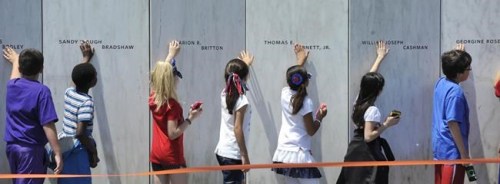 FILE - In this May 24, 2016 file photo, fourth grade students from Baldwin-Whitehall school district near Pittsburgh, touch the 
