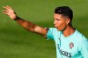 Portugal's Cristiano Ronaldo gestures during a training session in Oeiras, Portugal, Monday, Aug. 30, 2021. Portugal will play Ireland on Wednesday in a Qatar 2022 World Cup qualifying match. (AP Photo/Armando Franca)
