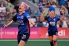 OL Reign forward Megan Rapinoe, left, celebrates with Eugenie Le Sommer, right, after scoring a goal on a penalty kick against the Portland Thorns during the first half of an NWSL soccer match, Sunday, Aug. 29, 2021, in Seattle. The goal was Rapinoe's second during the first half. (AP Photo/Ted S. Warren)