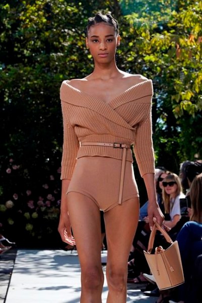 The Michael Kors Spring/Summer 2022 collection is modeled during Fashion Week in New York, Friday, Sept. 10, 2021. (AP Photo/Richard Drew)