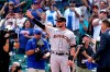 San Francisco Giants' Kris Bryant greets Chicago Cubs fans before a baseball game in Chicago, Friday, Sept. 10, 2021. (AP Photo/Nam Y. Huh)
