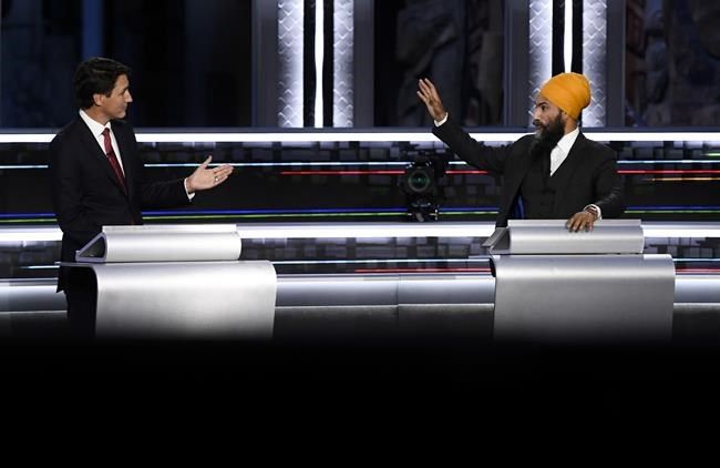 Liberal Leader Justin Trudeau, left, and NDP Leader Jagmeet Singh, take part in the federal election English-language Leaders debate in Gatineau, Que., on Thursday, Sept. 9, 2021. Federal leaders have not focused on addressing systemic racism during the campaign, despite the urgency of the issue after findings of unmarked graves at former residential schools and rising hate against minority communities during the COVID-19 pandemic, says the founder of an anti-hate group. THE CANADIAN PRESS/Justin Tang