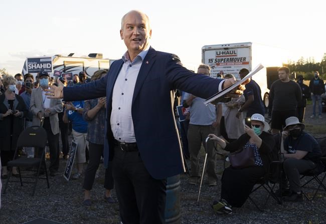 Conservative Leader Erin O'Toole greets supporters at a sunset rally in Whitby, Ont. on Friday, September 10, 2021. Canadians will vote in a federal election Sept. 20th. THE CANADIAN PRESS/Frank Gunn
