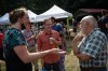 Patrick Weiler, centre, Liberal candidate for West Vancouver-Sunshine Coast-Sea to Sky Country, campaigns at Bowfest on Bowen Island, B.C., on Saturday, August 28, 2021. THE CANADIAN PRESS/Darryl Dyck