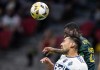 Vancouver Whitecaps' Erik Godoy, front, and Portland Timbers' Dairon Asprilla vie for the ball during the first half of an MLS soccer game in Vancouver, on Friday, September 10, 2021. THE CANADIAN PRESS/Darryl Dyck