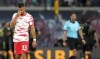 Leipzig's Andre Silva, left, after a call from the referee during the German Bundesliga soccer match between RB Leipzig and FC Bayern Munich in Leipzig, Germany, Saturday, Sept. 11, 2021. (AP Photo/Michael Sohn)