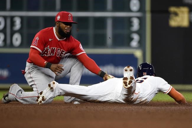 Houston Astros' Jose Siri, right, steals second past Los Angeles Angels shortstop Luis Rengifo during the fourth inning of a baseball game, Saturday, Sept. 11, 2021, in Houston. (AP Photo/Eric Christian Smith)