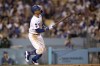 Los Angeles Dodgers' Mookie Betts watches his three-run home run during the fifth inning of the team's baseball game against the San Diego Padres in Los Angeles, Saturday, Sept. 11, 2021. (AP Photo/Kyusung Gong)