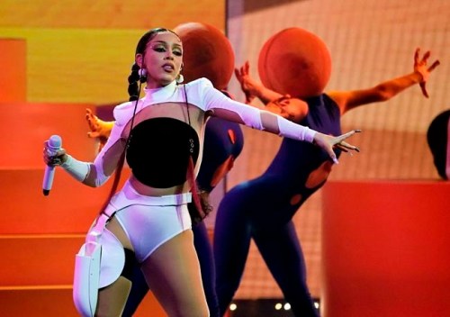 FILE - Doja Cat performs at the Billboard Music Awards in Los Angeles on May 21, 2021. Doja Cat will perform and serve as host for the 2021 MTV Video Music Awards, airing Sunday night at 8 p.m. EDT. (AP Photo/Chris Pizzello, File)