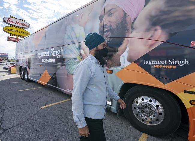 NDP leader Jagmeet Singh in makes his way back to his bus following a campaign stop in Sudbury, Ont., Sunday, September 12, 2021. THE CANADIAN PRESS/Jonathan Hayward
