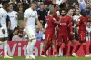 Liverpool's Mohamed Salah, 3rd right, celebrates after scoring the opening goal during the English Premier League soccer match between Leeds United and Liverpool at Elland Road, Leeds, England, Sunday, Sept. 12, 2021. (AP Photo/Rui Vieira)