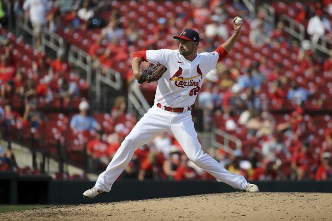 St. Louis Cardinals relief pitcher T.J. McFarland delivers during the seventh inning of a baseball game against the Cincinnati Reds, Sunday, Sept. 12, 2021, in St. Louis. (AP Photo/Scott Kane)