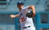 Los Angeles Dodgers starting pitcher Max Scherzer throws in the first inning against the San Diego Padres in a baseball game Sunday, Sept. 12, 2021, in Los Angeles, Calif. (AP Photo/John McCoy)