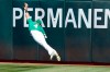 Oakland Athletics right fielder Chad Pinder cannot catch an RBI-triple by Texas Rangers' Leody Taveras during the fourth inning of a baseball game in Oakland, Calif., Sunday, Sept. 12, 2021. (AP Photo/Jeff Chiu)