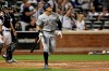 New York Yankees' Aaron Judge watches his two-run home run against the New York Mets during the eighth inning of a baseball game on Saturday, Sept. 11, 2021, in New York. (AP Photo/Adam Hunger)