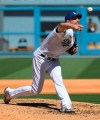 Los Angeles Dodgers Max Scherzer pitches his 3000th career strikeout with this throw against San Diego Padres first baseman Eric Hosmer in the fifth inning during in a baseball game Sunday, Sept. 12, 2021, in Los Angeles, Calif. (AP Photo/John McCoy)
