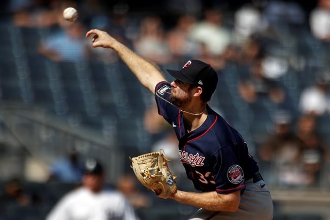 Minnesota Twins pitcher John Gant delivers to the New York Yankees during the first inning of a baseball game on Monday, Sept. 13, 2021, in New York. (AP Photo/Adam Hunger)