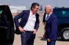 President Joe Biden talks with California Gov. Gavin Newsom as he arrives at Mather Airport on Air Force One Monday, Sept. 13, 2021, in Mather, Calif., for a briefing on wildfires at the California Governor's Office of Emergency Services. (AP Photo/Evan Vucci)